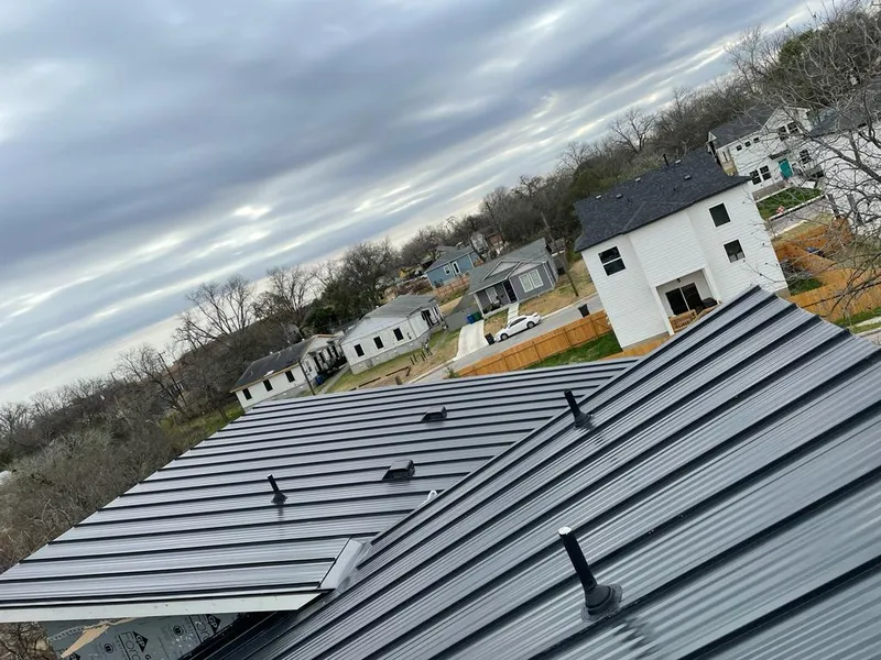 Standing seam metal roof panels with vents for Skylight Repair in McDonough